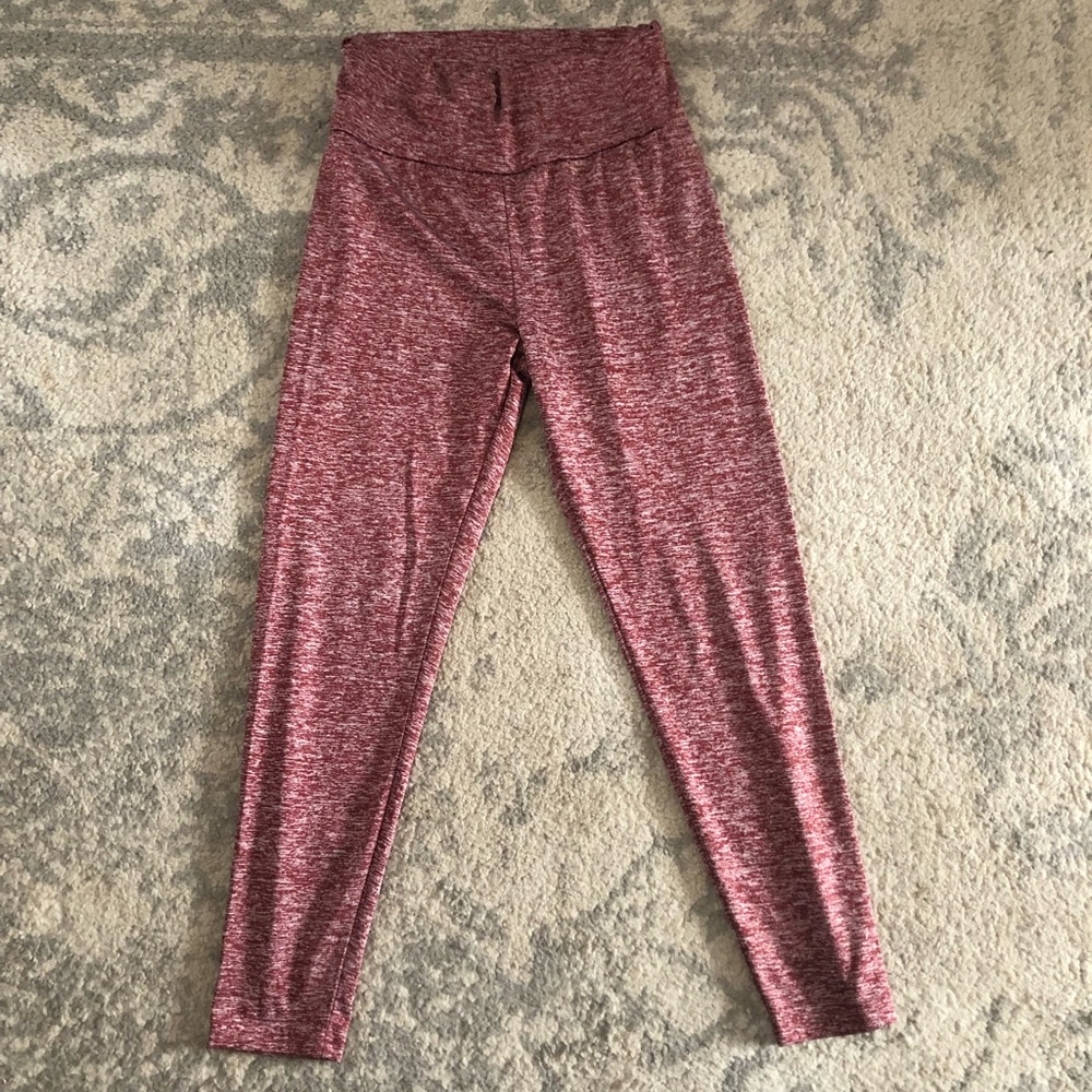 Red athletic Capri leggings and black yoga pants